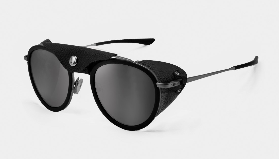 Lunettes Cébé Chill In Glacier forme ronde double bridge avec protections latérales sur fond de montagne